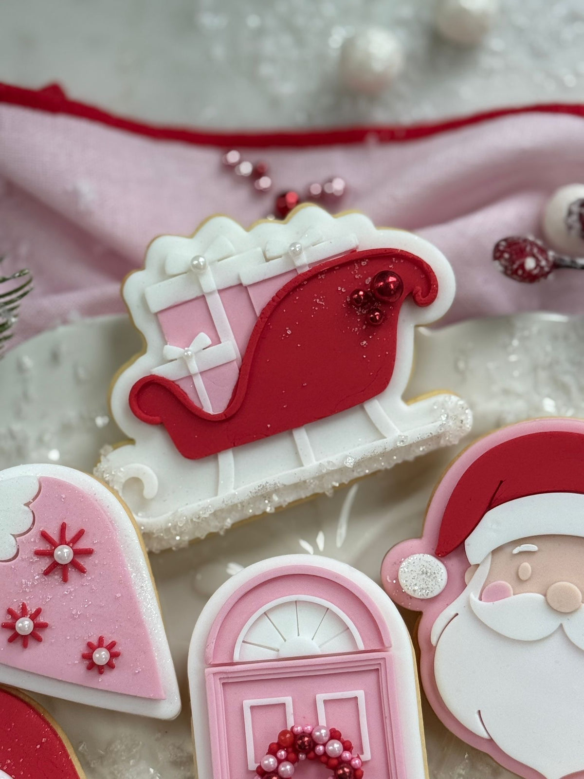 Sleigh (Presents) design stamped in fondant to show the finished cookie
