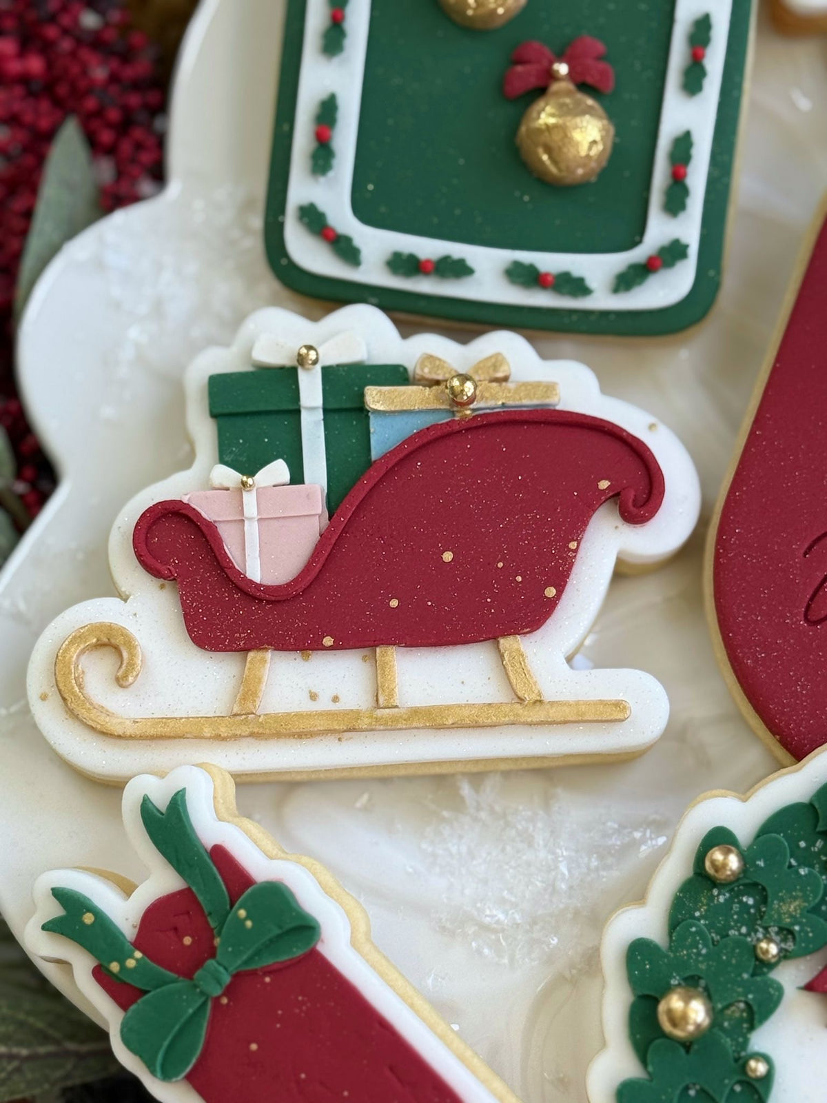 Sleigh (Presents) design stamped in fondant to show the finished cookie