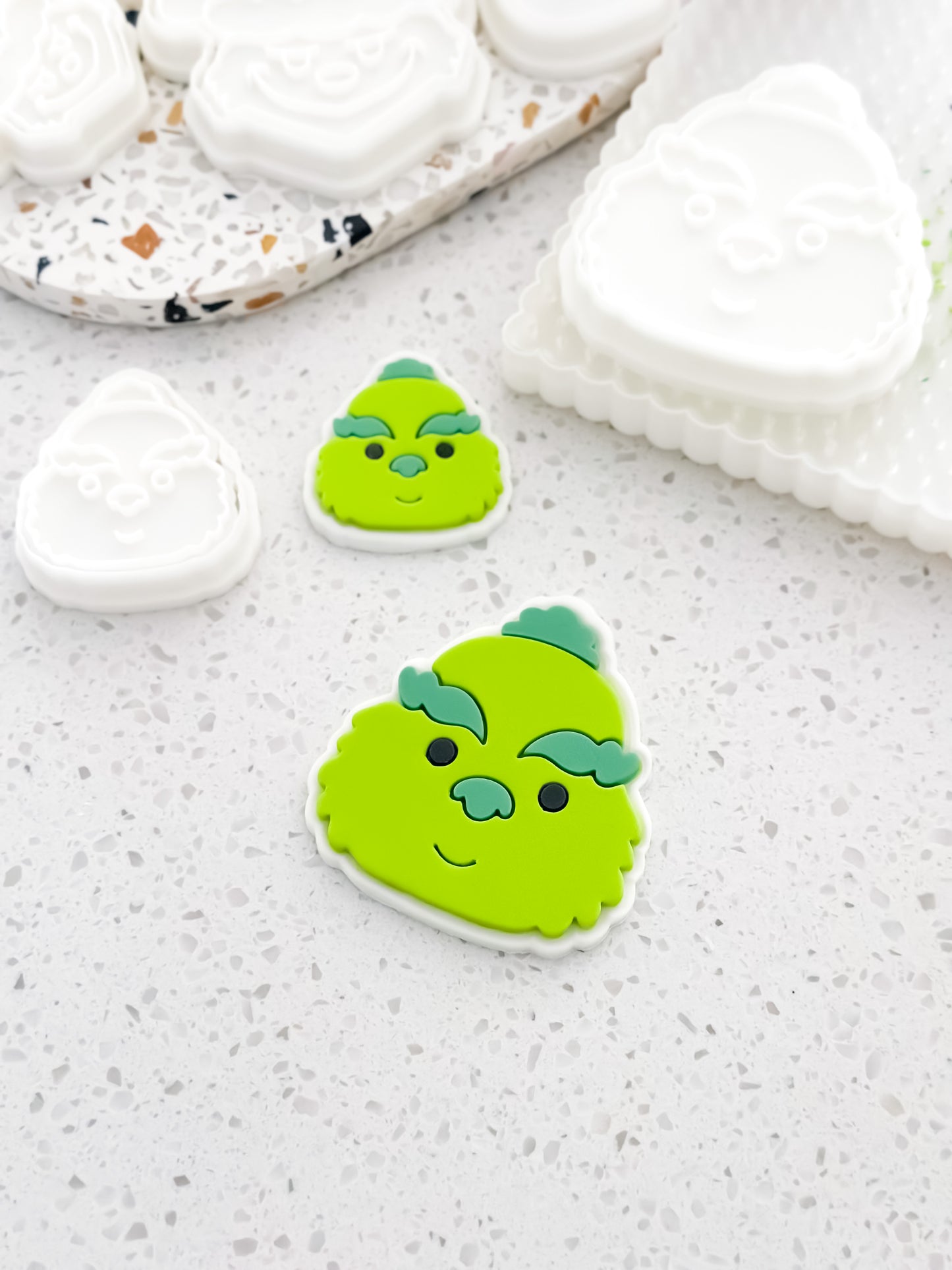 Christmas Grump (Simple) design stamped in fondant to show the finished cookie