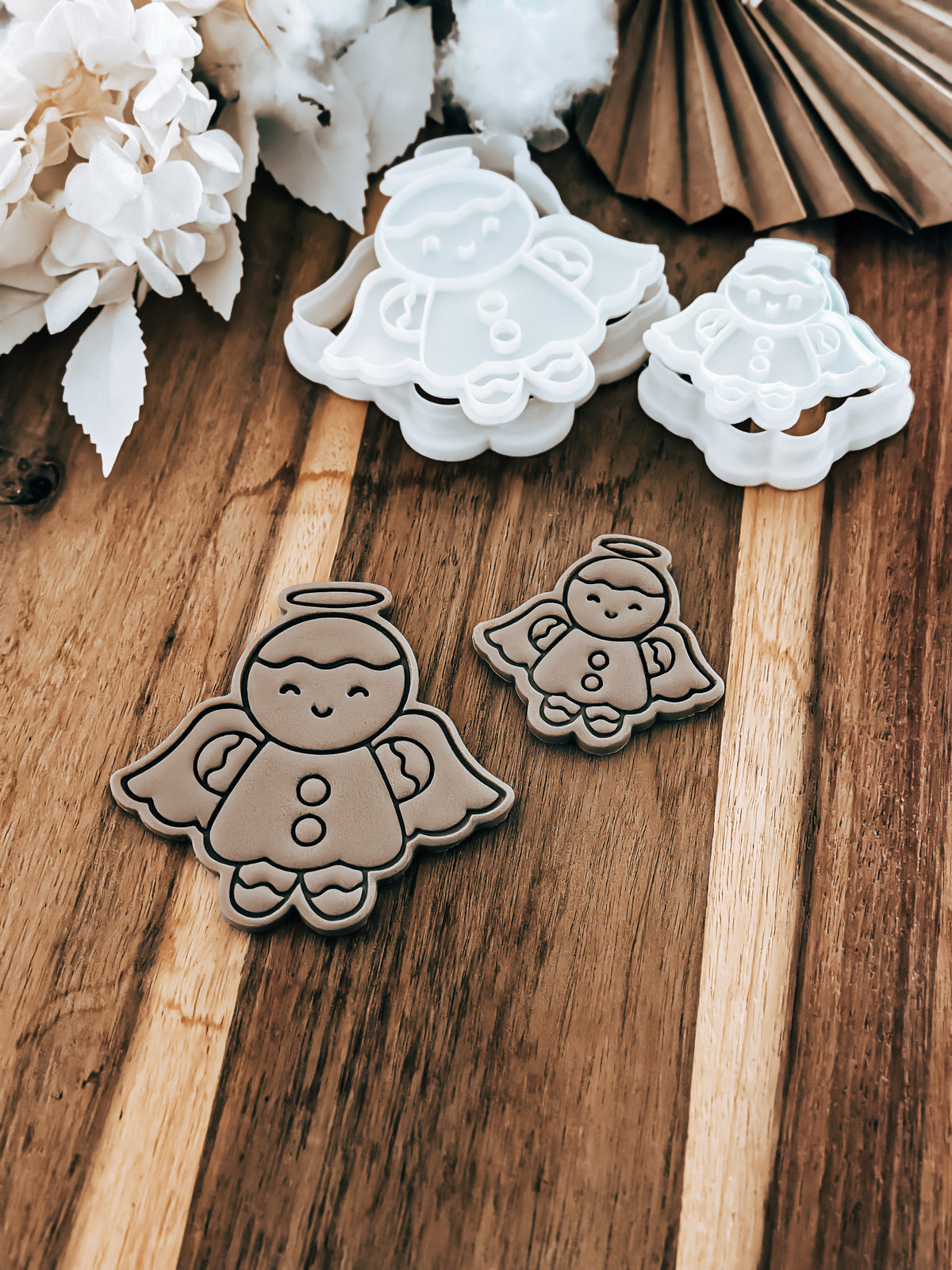Gingerbread (Angel) design stamped in fondant to show the finished cookie