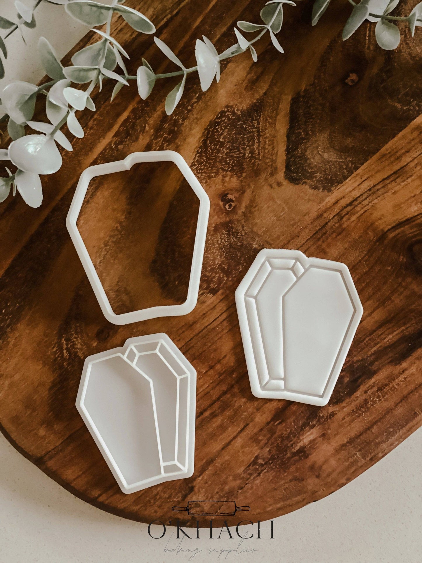 Coffin Halloween cookie stamp and cutter by O'Khach, shown stamped in fondant
