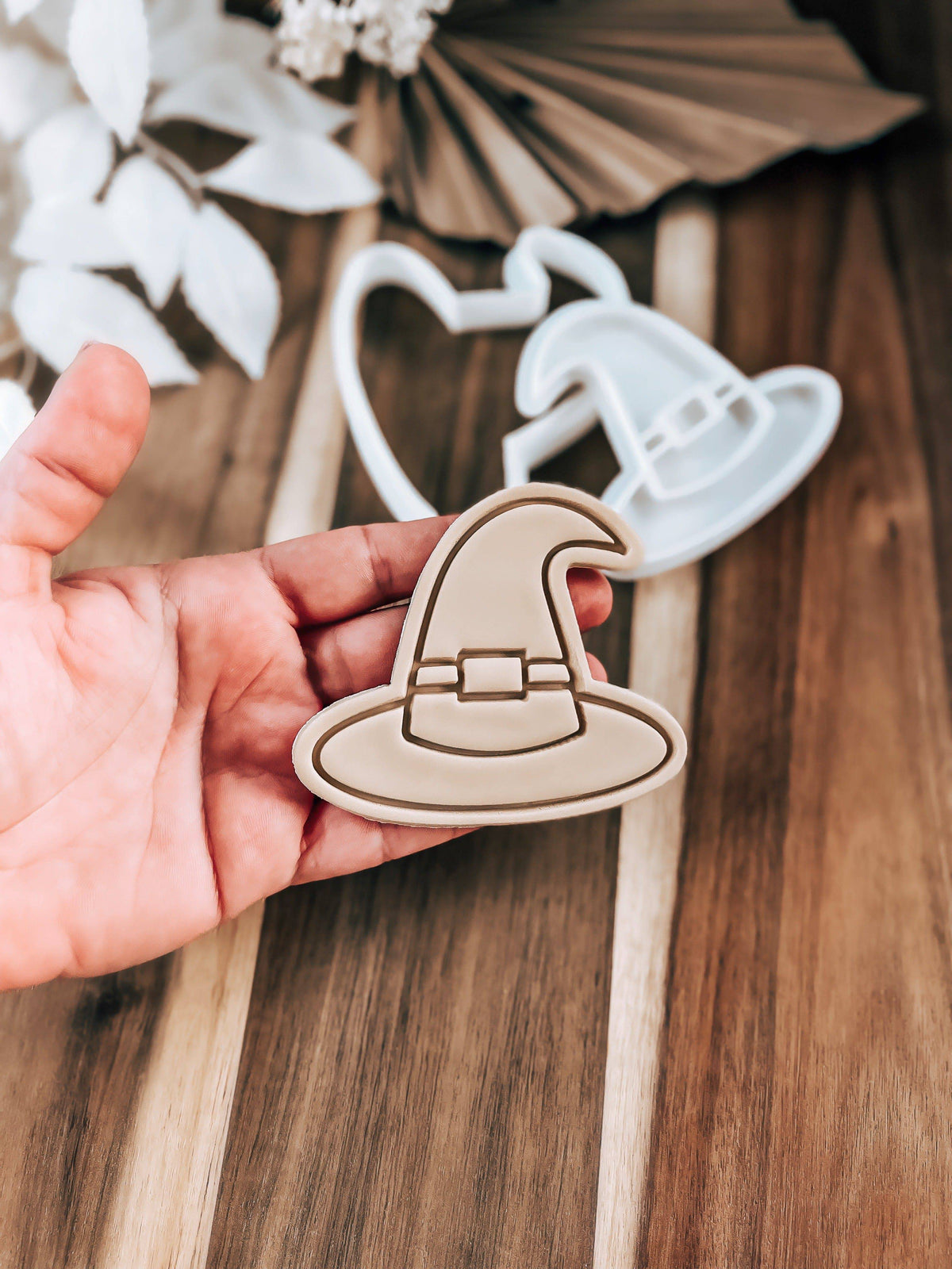 Witches Hat Halloween cookie stamp and cutter by O'Khach, shown stamped in fondant