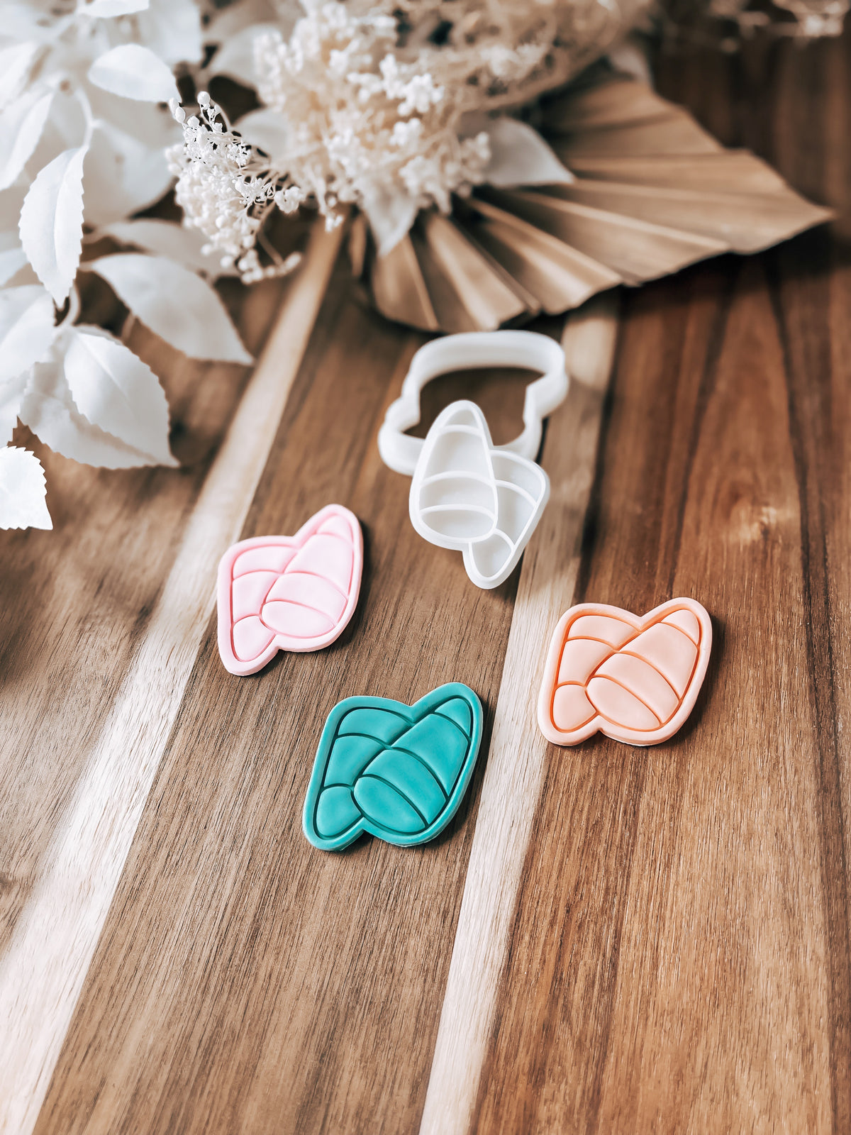 Mini Candy Corn Halloween cookie stamp and cutter by O'Khach, shown stamped in fondant