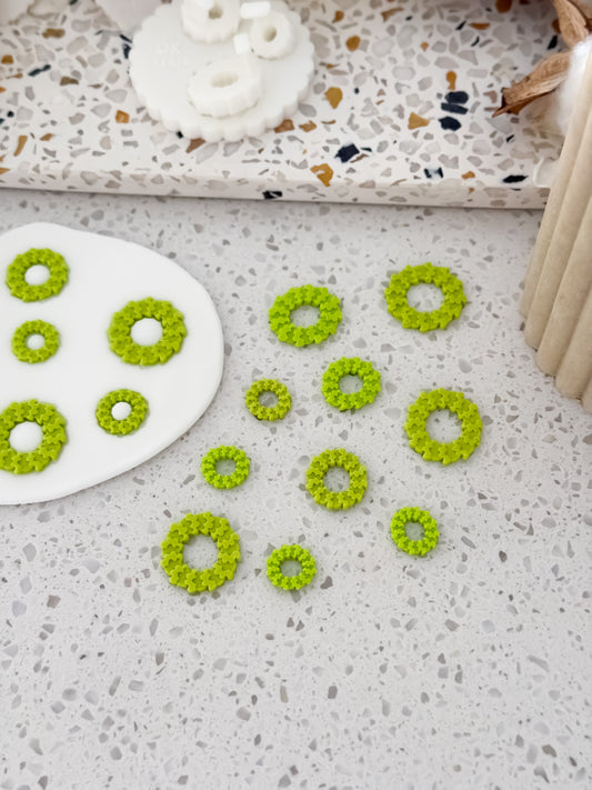 Green fondant Christmas wreaths made with the Two Tone Press mould by O'Khach Baking Supplies